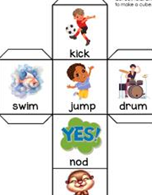 A paper cube template featuring different activities and expressions: 'kick' with a child playing soccer, 'swim' with a baby in water, 'jump' with a child jumping, 'drum' with a child playing drums, 'YES!' in a colorful speech bubble, and 'nod' with a cartoon character.